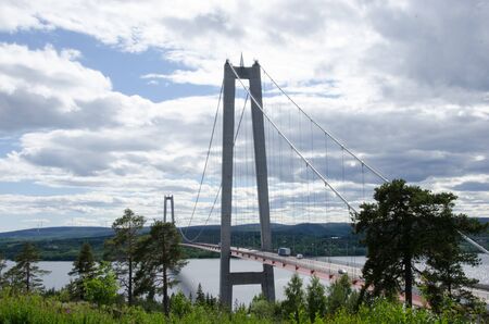 High coast, Sweden - 13 June 2018. The view from Hotel High coast of the bridge over the gulf of Bothnia on a slightly cloudy dayのeditorial素材