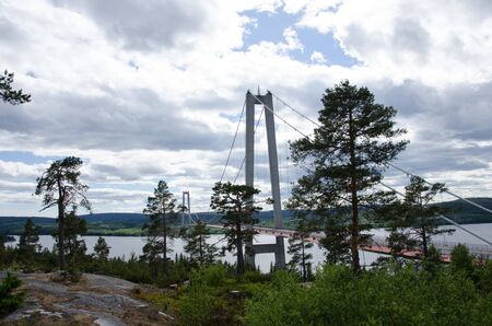 High coast, Sweden - 13 June 2018. The view from Hotel High coast of the bridge over the gulf of Bothnia on a slightly cloudy dayのeditorial素材
