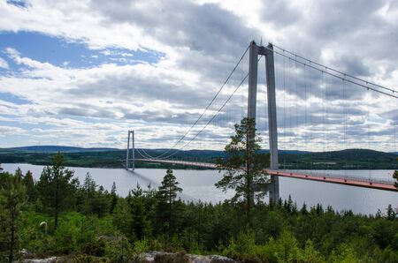 High coast, Sweden - 13 June 2018. The view from Hotel High coast of the bridge over the gulf of Bothnia on a slightly cloudy dayのeditorial素材