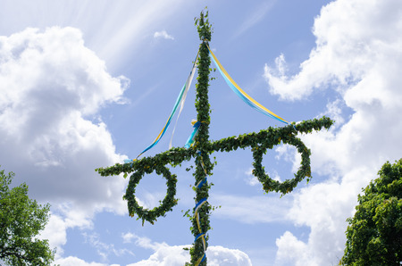 A midsummer pole has been raised for the festivities.の写真素材