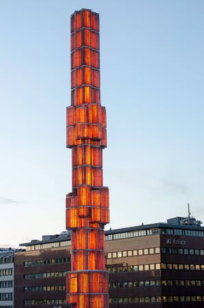Stockholm, Sweden - 20 January 2018. The obelisk at Sergel's square in central Stockholm, lit with red colors this early eveningのeditorial素材