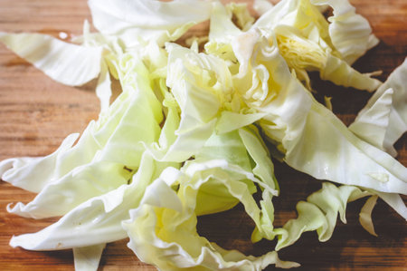 Cut Cabbage By Knife As Ingredient For Making Saladの写真素材