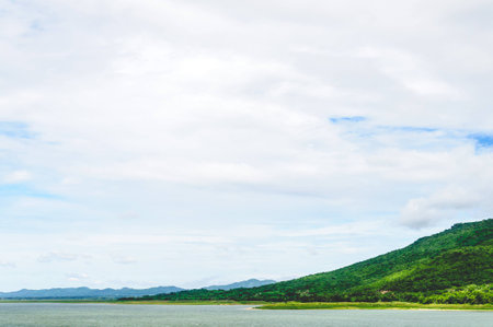 Cloudy Sky And Mountain View Of The Dam In North-East Of Thailandの写真素材