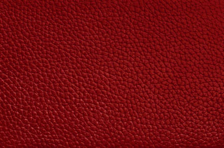 Dark red leather texture background with seamless pattern.