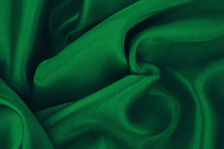 Dark green fabric flying texture background, detail of silk or linen pattern.の写真素材