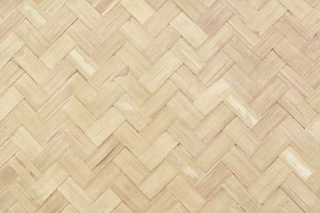 Old bamboo weave texture background, pattern of woven rattan mat in vintage style.の写真素材