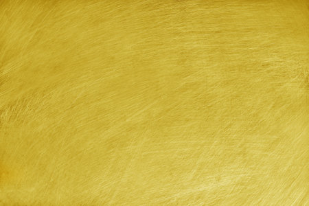 texture of old yellow golden aluminum metal with scratch for background.の写真素材