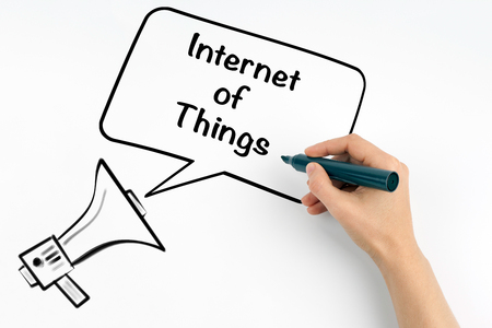 Internet of Things concept. Megaphone and text on a white background.の写真素材