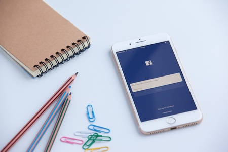 Riga, Latvia - February 1, 2017: Login Screen Facebook icons on Apple iPhone 7 Plus. largest and most popular social networking site in the worldのeditorial素材