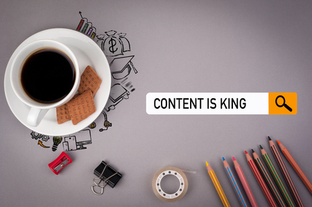 content is king concept. Gray office desk with the inscription.の写真素材