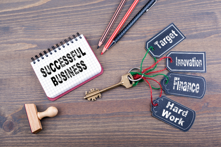 Successful Business concept. The key to success on a wooden office desk.の写真素材