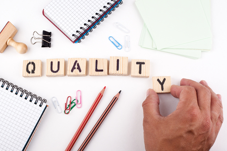 Quality concept. Wooden letters on a white background.の写真素材