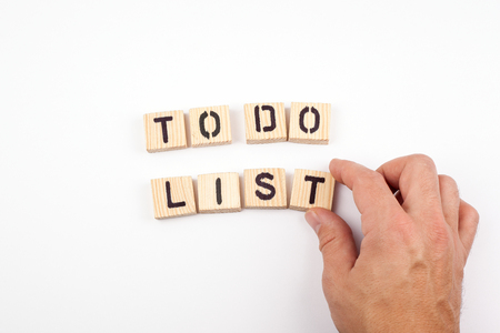 to do list. Wooden letters on a white background.の写真素材