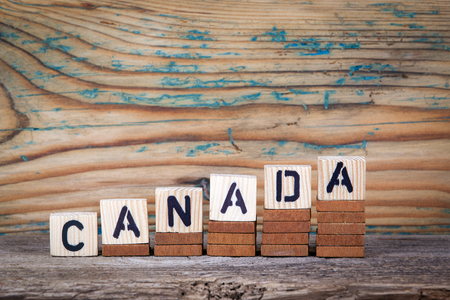 Canada. Wooden letters on the office desk, informative and communication background.の写真素材