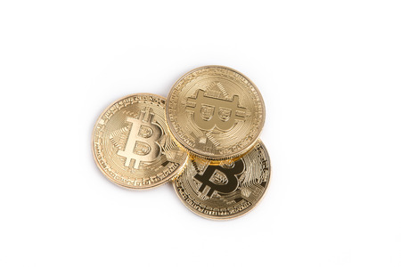 Crypto currency, golden bitcoin isolated on white background.の写真素材