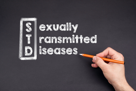STD, Sexually Transmitted Diseases health concept on a dark backgroundの写真素材