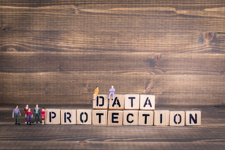 GDPR. General Data Protection Regulation. Cyber security and privacy concept. Wooden letters on the office desk, informative and communication backgroundの写真素材