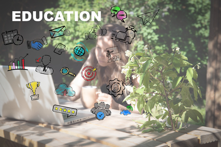 Education concept. Job with computer outdoors by wooden table at country, work from home. Business and freelancer conceptの写真素材