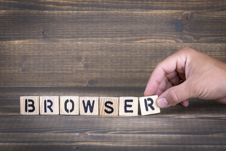 browser. wooden letters on the office desk, informative and communication background