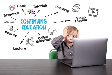 Continuing Education Concept. Chart with keywords and icons. Boy with laptopの写真素材