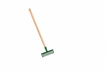 Small gardening rake isolated on white background Small gardening rake isolated on white background