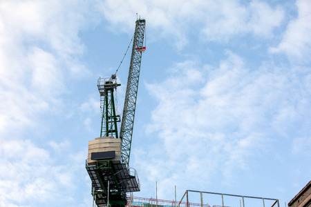 Construction crane with blank advertising space. Construction site, high-rise constructionの写真素材