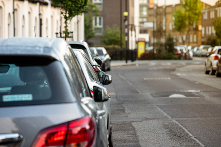 Cars parked on the street. City of London, United Kingdom