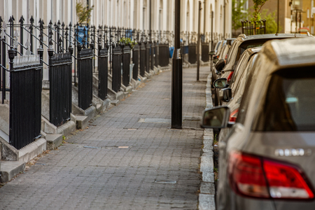 Cars parked on the street. City of London, United Kingdomの写真素材