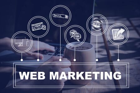 WEB MARKETING concept. Job with computer outdoors by wooden table at country, work from homeの写真素材