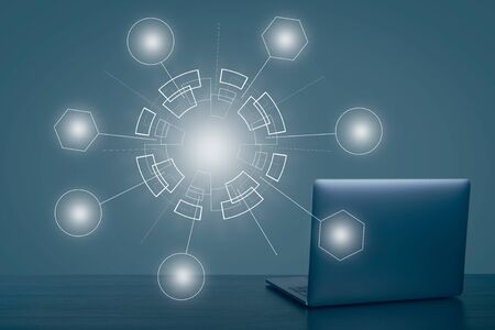 Abstract technology web background. Global network connection. Laptop on  wooden table and  white...