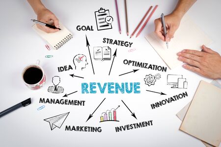 Revenue Concept. Chart with keywords and icons. The meeting at the white office tableの写真素材