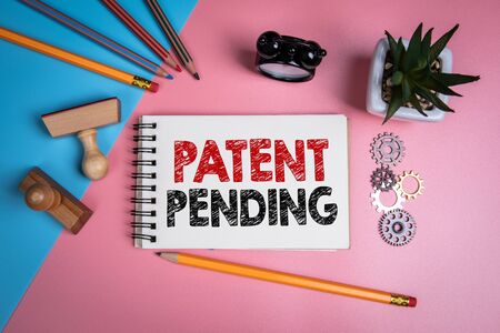 Patent Pending. Handwriitng text in the notebook.の写真素材