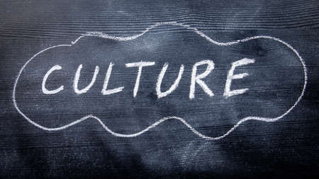 CULTURE. Business and ethics concept. Black painted wood and inscription with chalkの写真素材