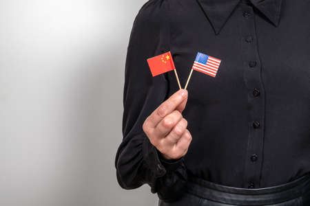 United States and chinese flag. Economic and political relations. Import export and trade warの写真素材