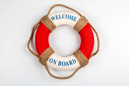 WELCOME ON BOARD. Lifebuoy with text on white backgroundの写真素材