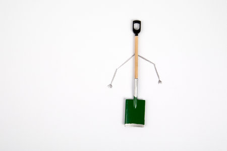 Miniature garden shovel. hobby, work and gardening concept. Free space for textの写真素材