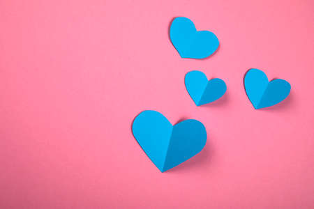 Blue hearts, symbolizing a boy or a man. Falling in love and relationships concepの写真素材