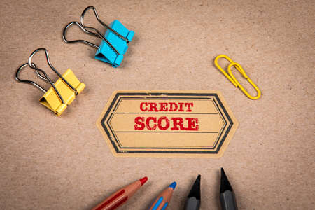 Credit Score. Cardboard notebook cover and colored pencilsの写真素材
