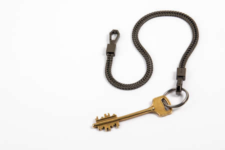 Home key with black metal chain. Copy spaceの写真素材