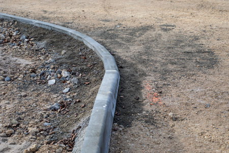 Concrete road curb. Road reconstruction and construction worksの写真素材