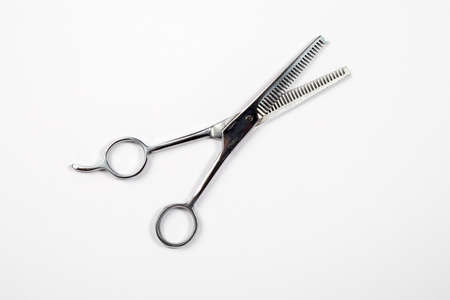 Hairdressing scissors on a white background. For professional and home useの写真素材