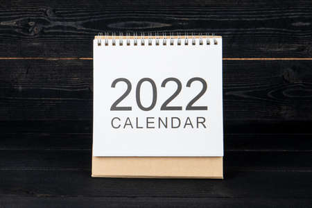 2022 Calendar. Planning, business and education concept. Black wooden backgroundの素材 [FY310175324517]