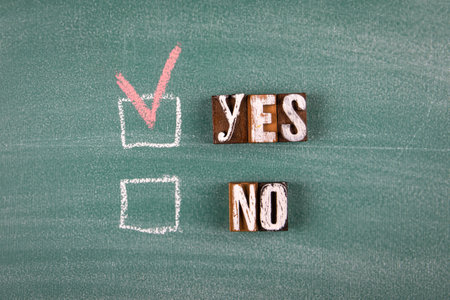 Yes or no survey. Green chalk board backgroundの写真素材