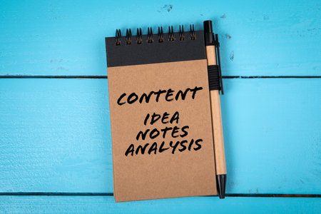 Content. Ideas Notes Analysis. Notebook on wooden background