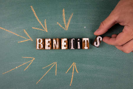 Benefits. Job offer, Business concept. Word on a green chalk board
