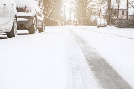 City street on a winter day. snowy and slipperyの写真素材