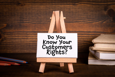 Do You Know Your Customers Rights. Miniature easel with text on office deskの写真素材