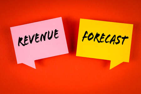 Revenue Forecast, Business concept. Speech bubbles on an orange backgroundの写真素材