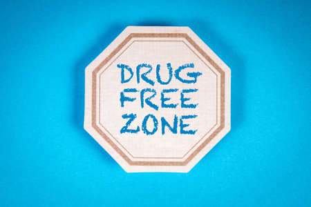 Drug Free Zone. Text on a decorative label sheet.Blue backgroundの写真素材