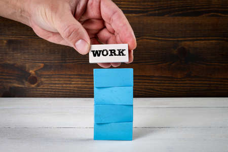 Work Concept. Colorful wooden blocks in a pileの写真素材